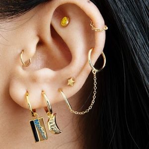 STUDS metro card charm huggie earrings (NWOT)